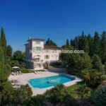 View of pool and Tuscan luxury villa