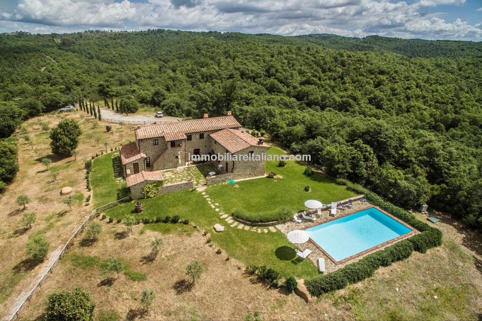Farmhouse in Tuscany with courtyard, pool, woodland and olive grove