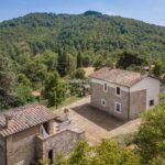 View of farhmhouse and barn in Umbria